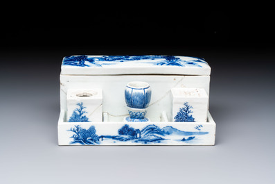 A rare Chinese blue and white 'Mountainous Landscape' writing set with an inkwell, sander and candlestick, Qianlong