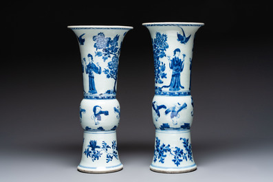 A pair of large Chinese blue and white 'Gu' vases with elegant ladies and playing boys, Kangxi