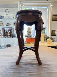 A Chinese hardwood stand with a mounted famille rose plaque, Republic