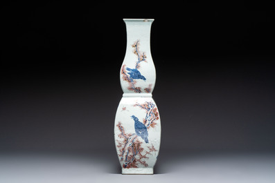 A Chinese blue, white and copper-red 'Birds among Flowering Branches' square gourd vase, 19th C.