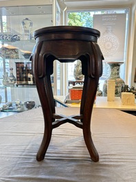A Chinese hardwood stand with a mounted famille rose plaque, Republic