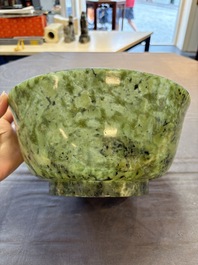 A large Chinese mottled-green serpentine bowl, 20th C.