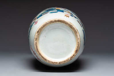 A Chinese doucai and famille rose rouleau vase with figures among antiquities, 19th C.