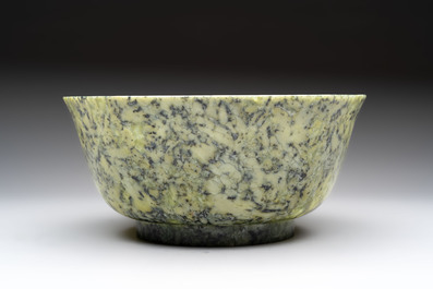 A large Chinese mottled-green serpentine bowl, 20th C.