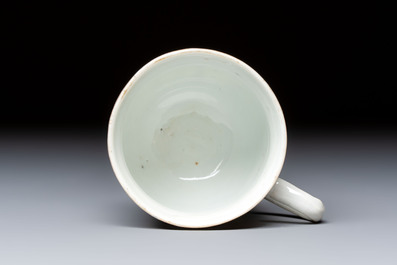 A fine Chinese Canton famille rose cup and saucer with figural design, Yongzheng/Qianlong