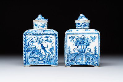 A pair of blue and white Dutch Delft square tea caddies and covers, 18th C.