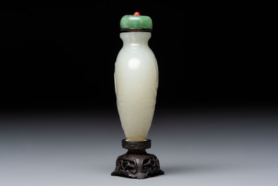 A Chinese carved white jade 'Geese' snuff bottle with a wooden stand, 18/19th C.