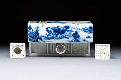 A rare Chinese blue and white 'Mountainous Landscape' writing set with an inkwell, sander and candlestick, Qianlong