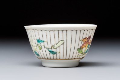 A Chinese famille rose cup and saucer with floral design, Yongzheng