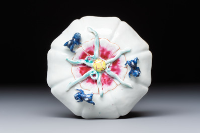 A rare Chinese famille rose moulded cup and saucer with floral design, Yongzheng