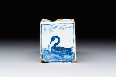 A blue, white and iron-red decorated English Delftware flower brick vase, 18th C.