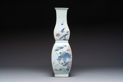 A Chinese blue, white and copper-red 'Birds among Flowering Branches' square gourd vase, 19th C.