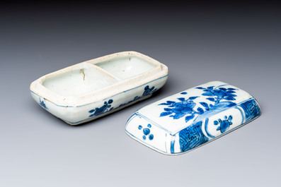 A Chinese blue and white betel nut box and cover with floral design, Wanli