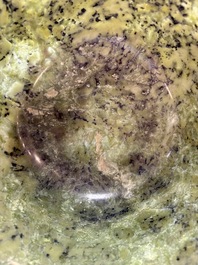 A large Chinese mottled-green serpentine bowl, 20th C.