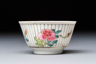 A Chinese famille rose cup and saucer with floral design, Yongzheng