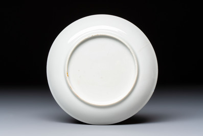 A fine Chinese Canton famille rose cup and saucer with figural design, Yongzheng/Qianlong