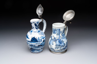 Two blue and white Dutch Delft chinoiserie jugs with pewter lid, 17/19th C.