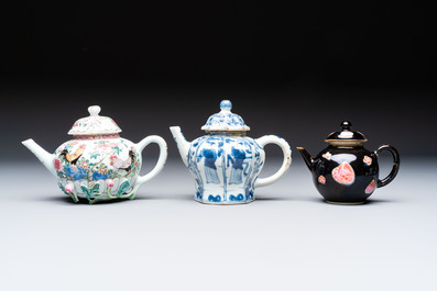 Three Chinese blue and white, famille rose and black-glazed covered teapots, a salt, an Imari-style covered bowl, and a famille verte bowl, 18th C.
