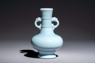 A Chinese claire-de-lune handled vase, with a wooden stand and its original hongmu box, Yongzheng mark, Republic