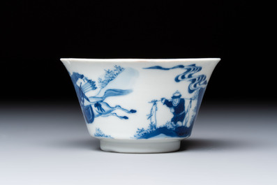 A Chinese blue and white 'Hunting Scene' cup and saucer, Kangxi