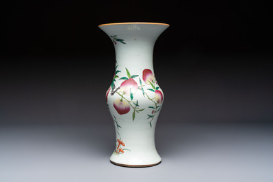 A Chinese famille rose 'Nine Peaches' 'Gu' vase, 19th C.