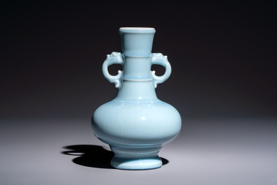 A Chinese claire-de-lune handled vase, with a wooden stand and its original hongmu box, Yongzheng mark, Republic