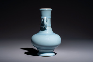 A Chinese claire-de-lune handled vase, with a wooden stand and its original hongmu box, Yongzheng mark, Republic