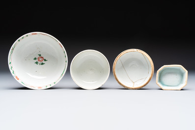 Three Chinese blue and white, famille rose and black-glazed covered teapots, a salt, an Imari-style covered bowl, and a famille verte bowl, 18th C.