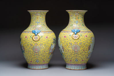 A pair of large Chinese famille rose yellow-ground 'Hu' vases with narrative design, Qianlong mark, Republic