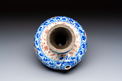 A Safavid blue, white and red pottery hookah base or kendi, Kirman, Persia, 17th C.