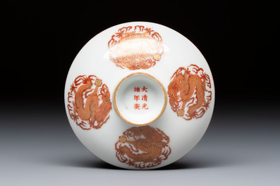 A fine Chinese iron-red gilt-decorated covered teabowl with a stand, Guangxu mark and of the period