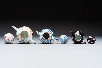 Three Chinese blue and white, famille rose and black-glazed covered teapots, a salt, an Imari-style covered bowl, and a famille verte bowl, 18th C.