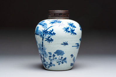 A Chinese blue and white 'Three Friends of Winter' jar with an openworked wooden cover, Transitional period