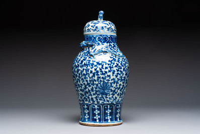 Three Chinese blue and white vases, one covered, Kangxi mark, 19th C. and later