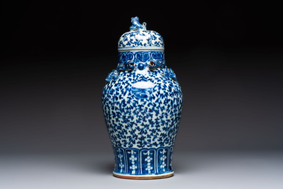 Three Chinese blue and white vases, one covered, Kangxi mark, 19th C. and later