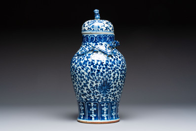 Three Chinese blue and white vases, one covered, Kangxi mark, 19th C. and later
