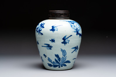 A Chinese blue and white 'Three Friends of Winter' jar with an openworked wooden cover, Transitional period