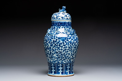 Three Chinese blue and white vases, one covered, Kangxi mark, 19th C. and later