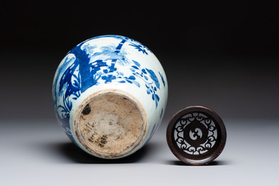 A Chinese blue and white 'Three Friends of Winter' jar with an openworked wooden cover, Transitional period