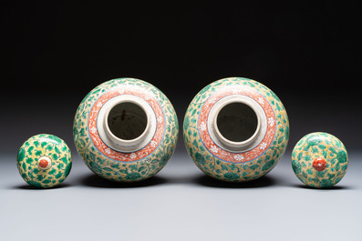 A rare pair of Chinese famille verte yellow-ground 'Flower Scroll' covered vases, Kangxi