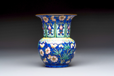 A Chinese Canton enamel 'Prunus on Cracked Ice' spittoon and two snuff dishes, 19th C.
