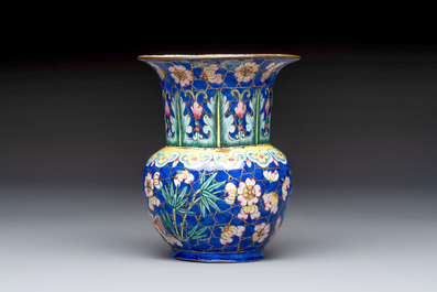A Chinese Canton enamel 'Prunus on Cracked Ice' spittoon and two snuff dishes, 19th C.