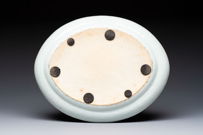 Two Chinese Canton famille verte serving dishes, a square bowl and stand with figural design, 19th C.