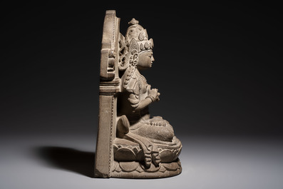 A Javanese carved stone figure of Prajnaparamita, 20th C.