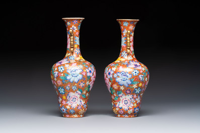A pair of Chinese famille rose 'Millefleur' vases, Qianlong mark, Republic
