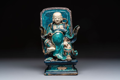 A Chinese fahua-glazed biscuit figure of Zhenwu, Ming