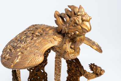 An exceptional Vietnamese gilt-lacquered wood and ivory 'Dragon and Phoenix' throne-shaped altar, 18/19th C.