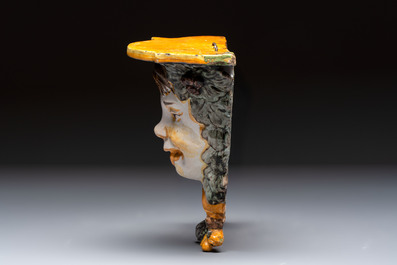 A polychrome Italian maiolica 'Faun Head' wall console, 19th C.