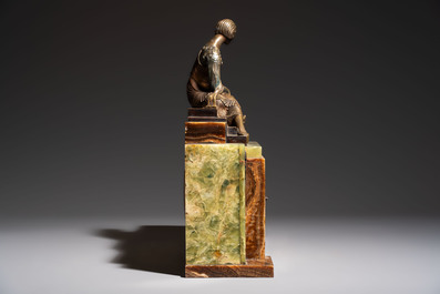 Georges Lavroff (1895&ndash;1991): An Art Deco three-piece copper-alloy-mounted green and brown onyx mantelpiece garniture, ca. 1900