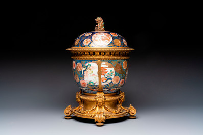 Two Japanese Imari covered bowls, one mounted in silver and wood and the other with gilt-bronze mounts, Meiji, 19th C.